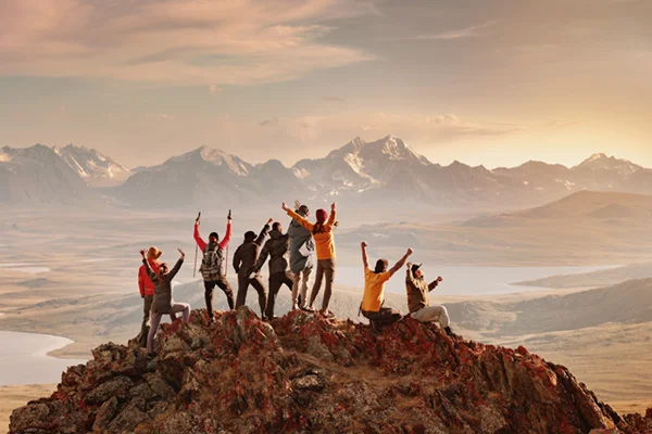 Group Trip Hiking to Peak of Mountain
